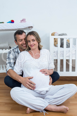 Pregnant couple at home