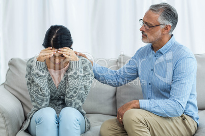 Therapist consoling a woman