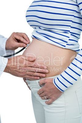 Doctor examining pregnant woman