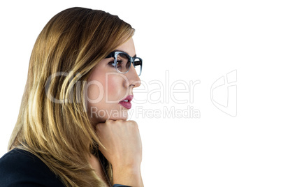 Woman touching her chin with her fist