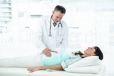 Doctor examining a pregnant woman