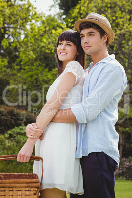 Young couple embracing outdoors