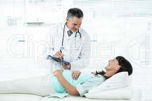 Doctor examining a pregnant woman