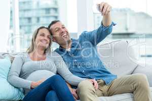 Couple taking a selfie on smartphone