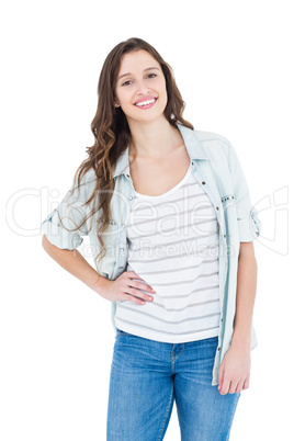Smiling young woman posing in front of the camera