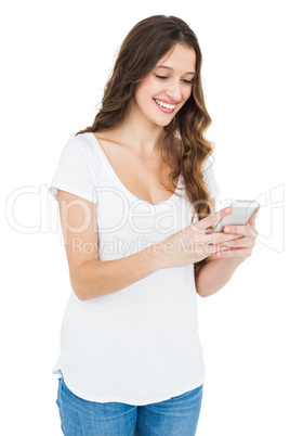 Smiling woman using her smartphone