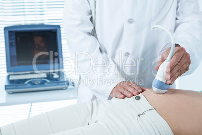 Pregnant woman undergoing ultrasound test