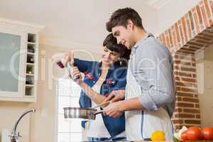 Woman pouring salt into utensil