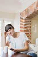 Young woman listening to music on smartphone