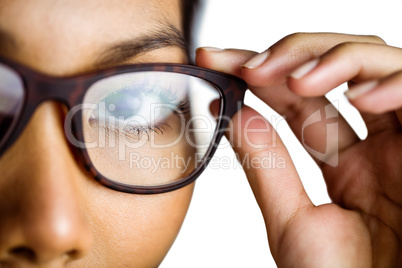 Close up view of a businesswoman holding her eyeglasses