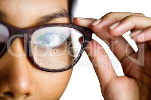 Close up view of a businesswoman holding her eyeglasses