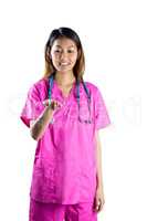 Asian nurse stretching out hand