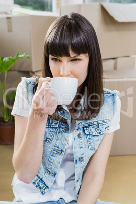 Young woman having coffee