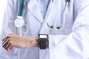 Asian doctor showing her smart watch