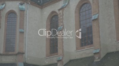 Snow on church in slow-motion (Leipzig / Germany)
