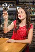Pretty woman having a glass of wine
