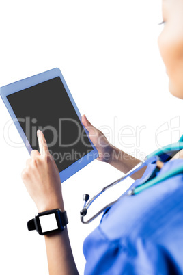 Asian nurse using tablet