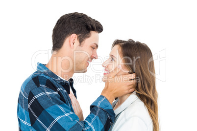 Cute couple embracing and looking to each other