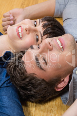 Couple at home relaxing on the floor