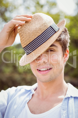 Close-up of young man standing in garden