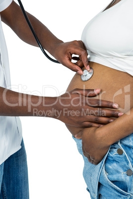 Doctor examining a pregnant woman