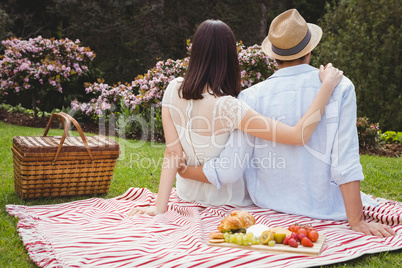 Young couple embracing outdoors