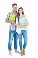 Portrait of students couple holding books