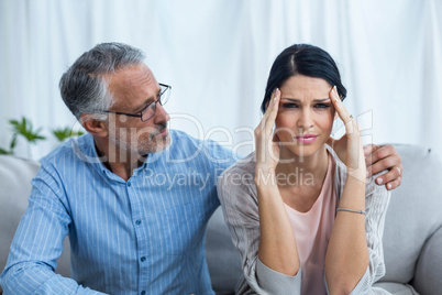 Therapist consoling a woman