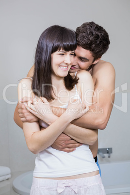 Romantic couple embracing each other