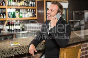 Handsome man having a phone call