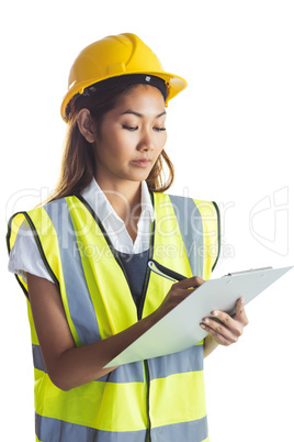 Architect woman with yellow helmet and plans