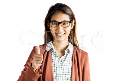 Smiling businesswoman showing a thumbs up