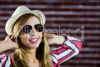 Smiling woman wearing sunglasses