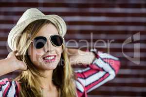Smiling woman wearing sunglasses
