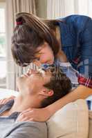 Couple at home relaxing on the sofa