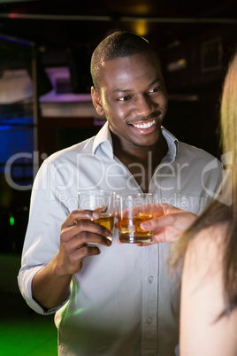 Man toasting his whisky glass