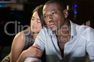 Young couple sitting together