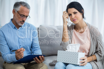 Therapist consoling a woman