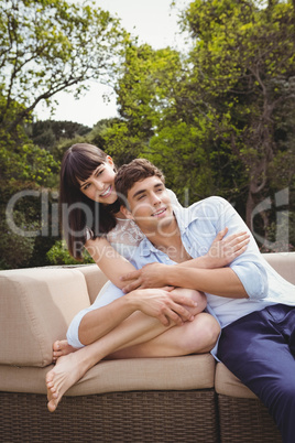 Young couple embracing outdoors