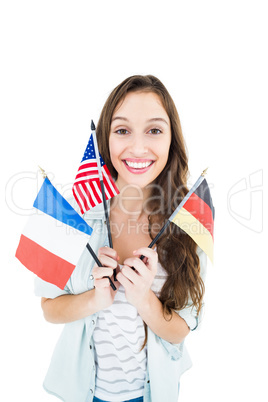 Female student holding several flags