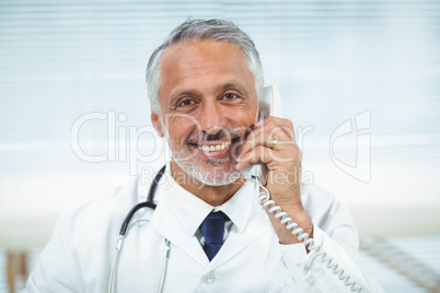 Doctor talking on phone