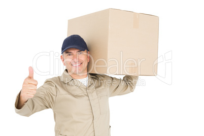 Delivery man carrying a package and showing a thumbs up