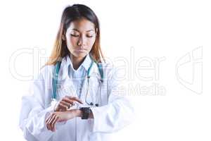 Asian doctor using her smart watch