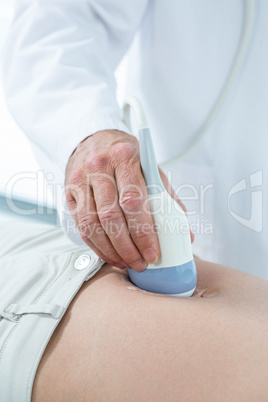 Pregnant woman undergoing ultrasound test