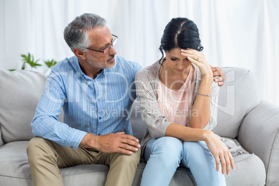 Therapist consoling a woman