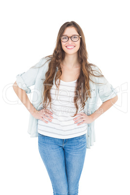 Portrait of female student with hands on hips