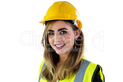 Smiling woman wearing construction clothing