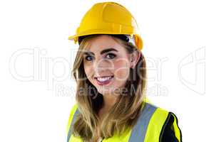 Smiling woman wearing construction clothing