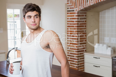 Young man having a cup of coffee