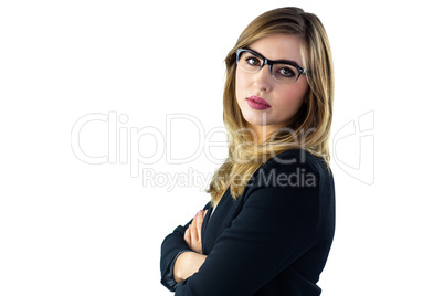 Woman with arms crossed looking at camera
